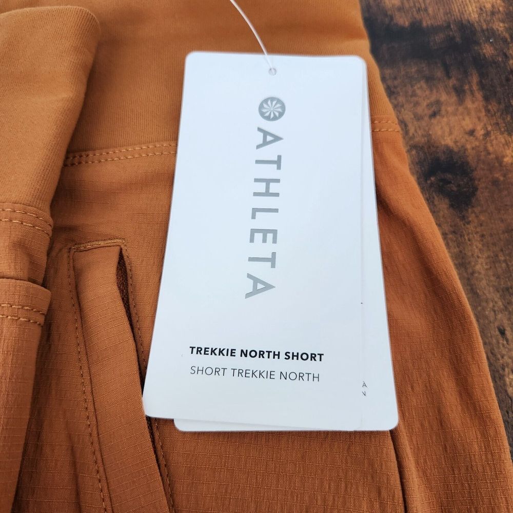 Athleta Womens 26 Orange Semi Fitted Lightweight Stretch Trekkie North Short NWT - Picture 8 of 12